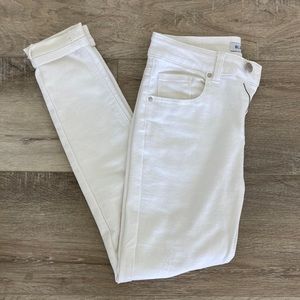 Blue Savvy white jeans with two small rips. Womens size 7/28.